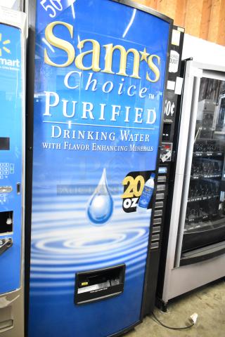 Commercial floor-style vending machine for Sam's Choice Purified Water, 115 volts, 1 phase, vibrant blue with water graphics.