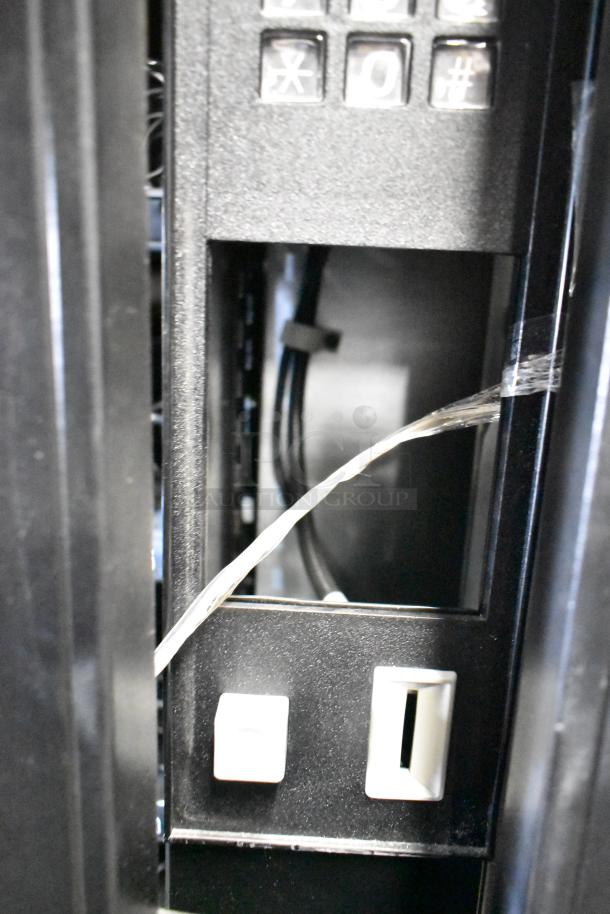 Crane 167 Commercial Vending Machine, floor style, 115 volts, 1 phase, in good condition. Keypad and coin slot visible.