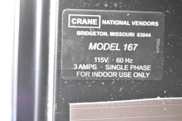 Crane 167 Commercial Vending Machine label showing model and specs: 115V, 60Hz, 3 Amps, single phase, indoor use.