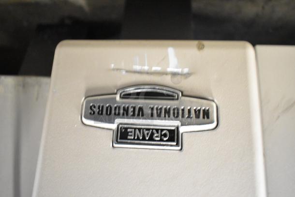 Crane 181 vending machine, commercial floor style, 115 volts, 1 phase. Visible "National Vendors" branding in fair condition.