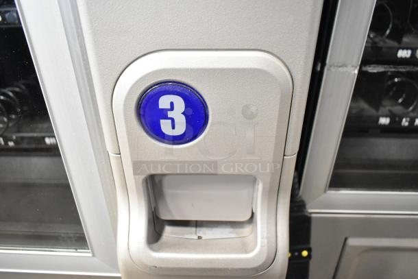 Crane 181 Commercial Vending Machine, floor style, 115 volts, 1 phase, showing selection number 3 button.