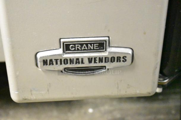 Crane 181 Commercial Vending Machine, 115 Volts, 1 Phase, features "Crane National Vendors" label, floor style.