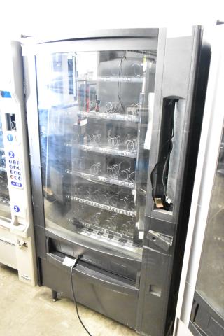 Crane 167 commercial vending machine, floor style, 115V, 1 phase, black exterior, visible spiral slots.
