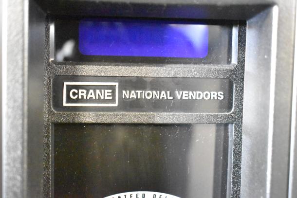 Crane 167 Commercial Vending Machine, floor style, 115 volts, 1 phase. "Crane National Vendors" label displayed prominently.