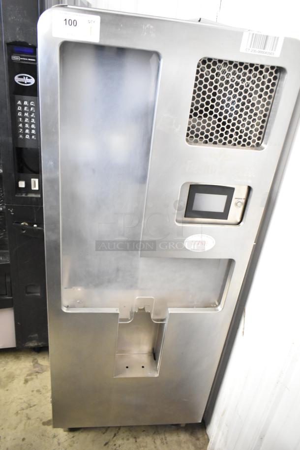 JBT Fresh N Squeeze citrus juicer, commercial floor model, stainless steel, on casters, 115 volts, touchscreen panel.