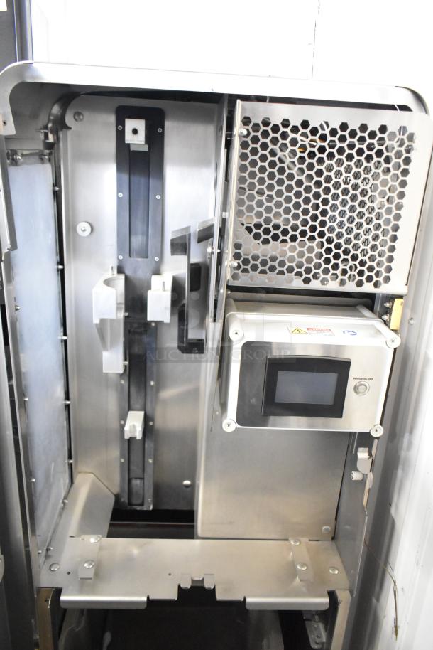 JBT Fresh N Squeeze citrus juicer, commercial floor style, on casters. Stainless steel interior with control panel. 115V, 1 phase.