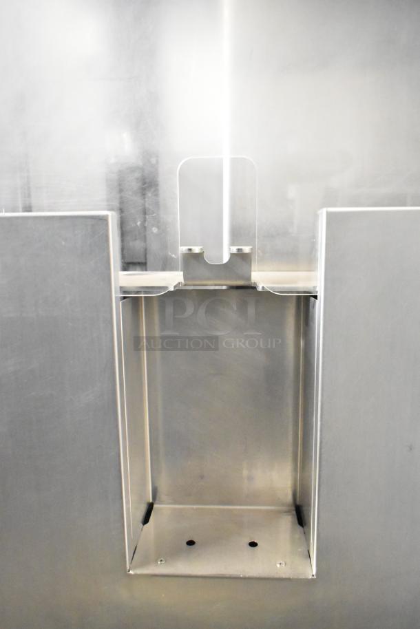 JBT Fresh N Squeeze citrus juicer, commercial floor style on casters, 115 volts, 1 phase, stainless steel finish.