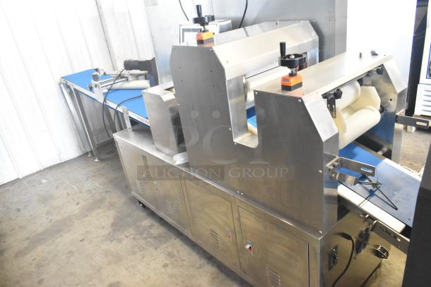 Commercial floor-style multi-roll dough sheeter on casters, 230V, stainless steel finish, includes control knobs and conveyor system.