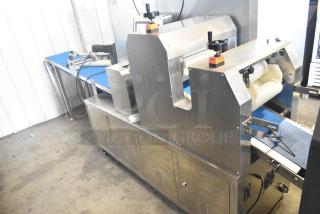 Commercial floor-style multi-roll dough sheeter on casters, 230V, stainless steel finish, includes control knobs and conveyor system.