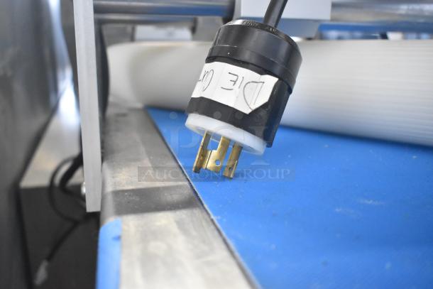 Commercial floor-style dough sheeter with multi-rolls on casters, 230V plug, "Die Cut" label visible.