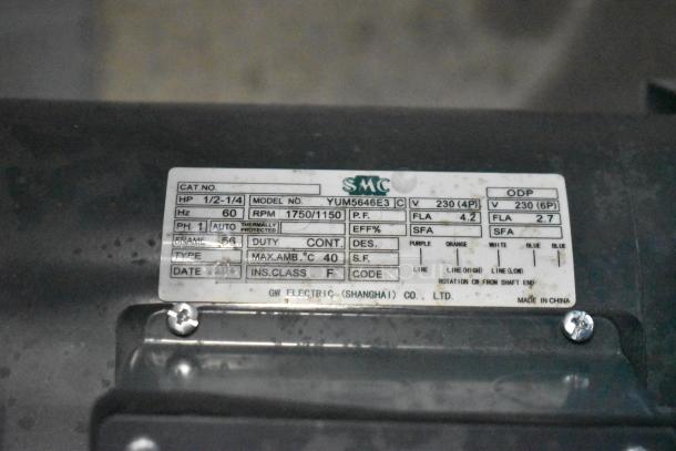 Commercial dough sheeter label, model YUM5646E3, 230 volts, ½-1¼ HP, 1750/1150 RPM, by GW Electric Shanghai, on casters.