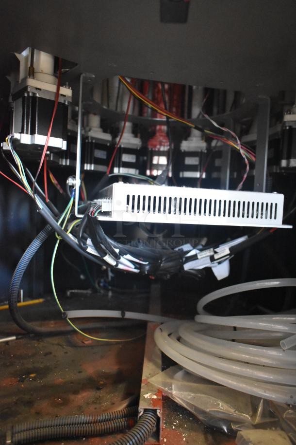 Hero Archimede A260 paint dispenser interior, showing wiring and tubes. Model features industrial design, suitable for commercial use.