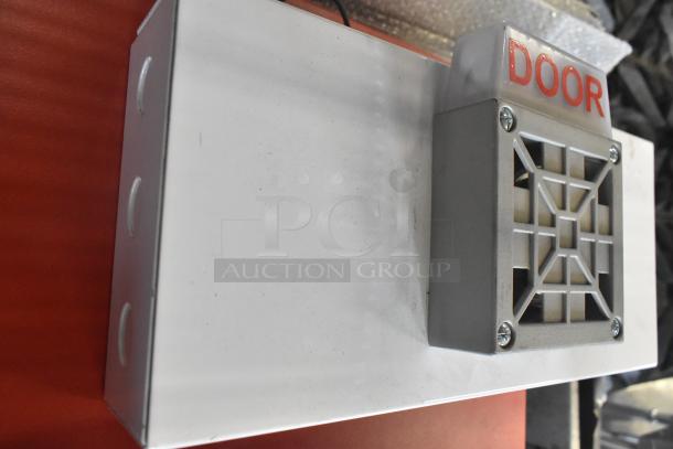 Altronix box with vented cover marked "DOOR" in red. Appears in good condition. Auction for two items.