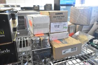 6 various items including a Dexter 10863 3" oyster knife in its box and glass salt shaker set, stacked on a shelf.