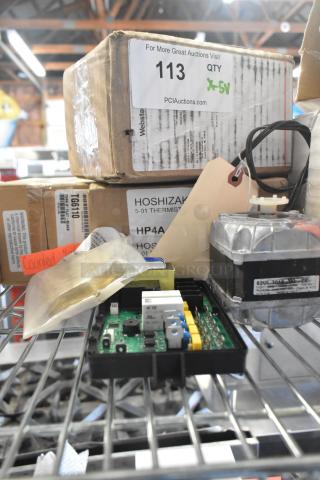 Assorted auction items include HP4A486501 Hoshizaki thermistor, Cambro TG6110 black tongs. Visible boxes and components.
