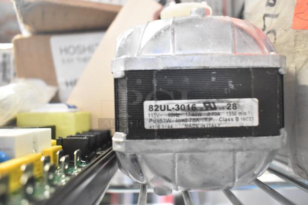 Hoshizaki 4A4865-01 thermistor-defrost and accessories, includes a labeled motor and electrical components, stored in warehouse.