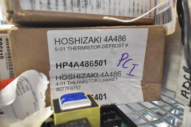 Hoshizaki HP4A486501 thermistor-defrost label on box with visible barcode and handwritten "PCI" marking.