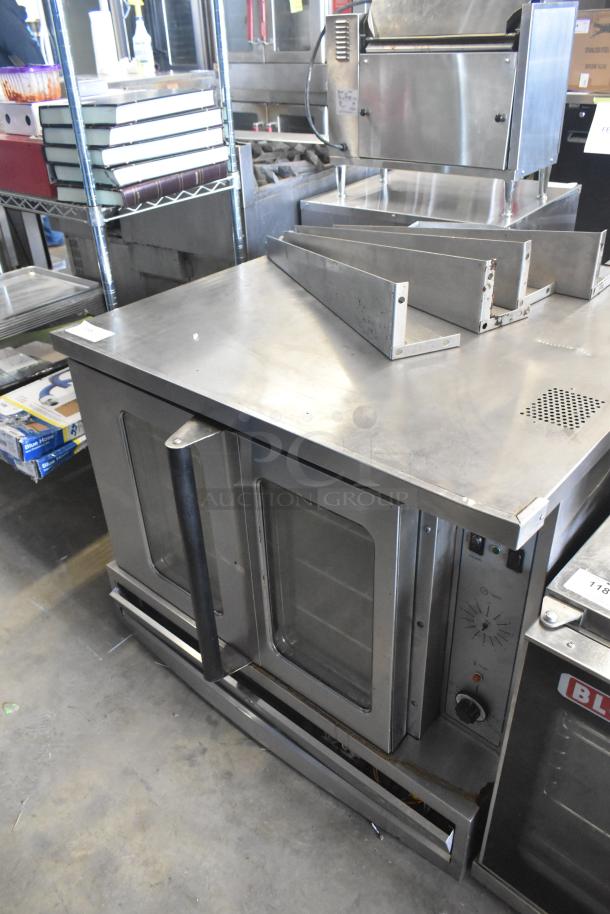 Garland SunFire gas convection oven with view-through doors, thermostatic controls, metal legs; well-maintained.