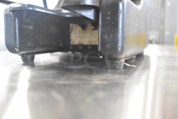 Bregani Countertop Espresso Bean Grinder, missing lid, 115 volts, 1 phase, worn condition, black with visible scratches.