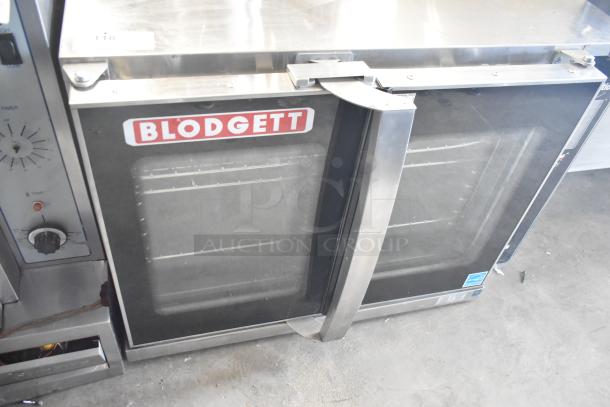 Blodgett Hydrovection stainless steel commercial convection oven with view-through doors, metal racks, visible brand logo.
