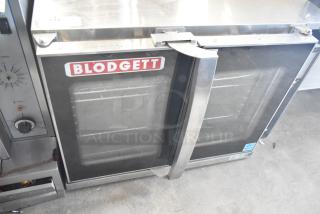 Blodgett Hydrovection stainless steel commercial convection oven with view-through doors, metal racks, visible brand logo.