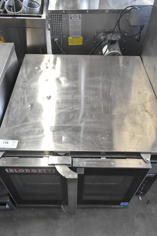 Blodgett Hydrovection Helix stainless steel commercial convection oven with view-through doors and metal racks, in used condition.