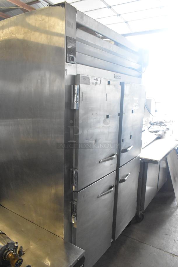 Traulsen RHT 2-32NUT commercial cooler with four half-size doors on casters. 115 volts, 1 phase, stainless steel exterior.