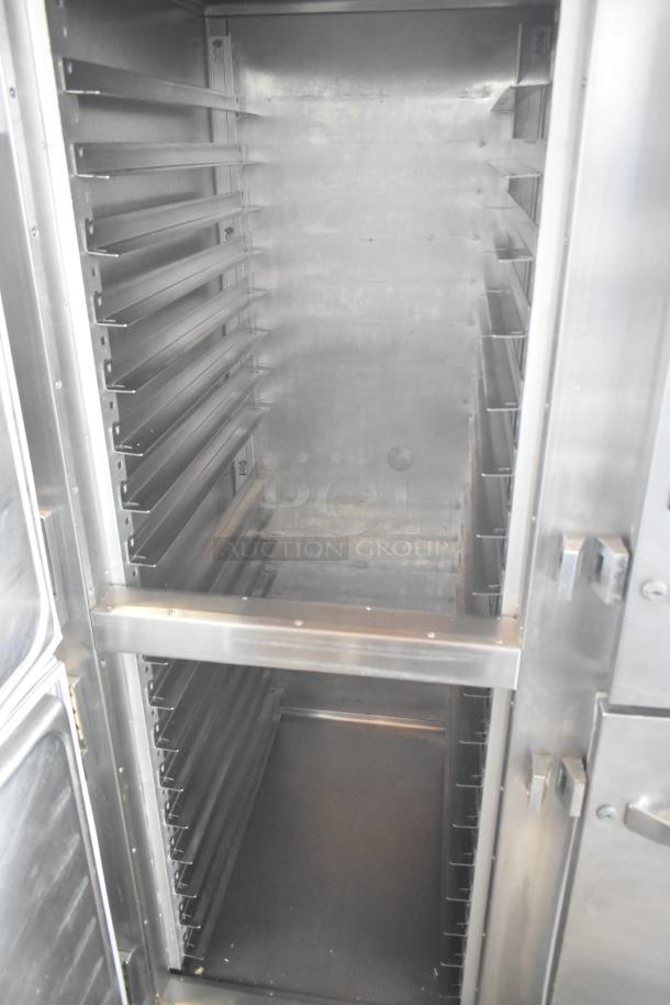 Traulsen RHT 2-32NUT commercial cooler, 4 half-size doors, on casters, interior shelving visible, stainless steel, 115V, 1 phase.