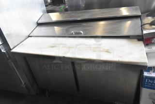 Beverage Air SPE48HC-12C prep table with mega top, bain marie, commercial casters. Stainless steel, 115V, 1 phase, used condition.