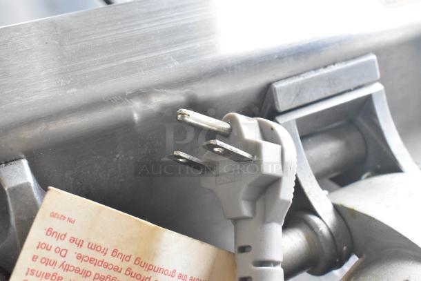 Wells WB2E Commercial Double Waffle Maker plug detail, 208/240V, 1 Phase, showing grounded 3-prong plug and metal finish.