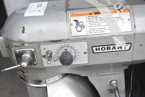 Hobart A200 commercial dough mixer, 115V, 1 phase. Features speed control knob and warning label. Used condition.