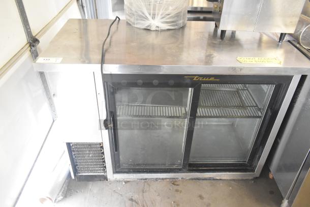 True TBB-24-48G-SD-S-LD back bar cooler, stainless steel top, dual glass doors, 115V, 1 Phase, used condition.