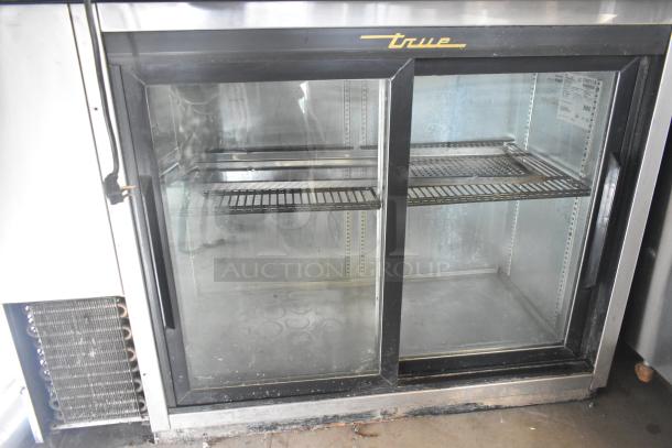 True TBB-24-48G-SD-S-LD back bar cooler, two glass doors, metal shelves, 115V, 1 phase, used condition.