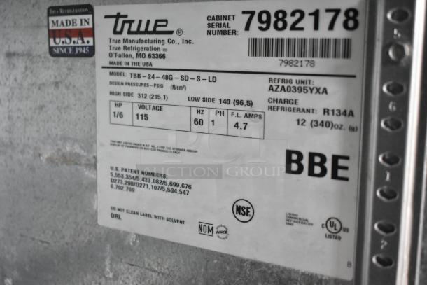 True TBB-24-48G-SD-S-LD 2-door back bar cooler label, 115V, R134A refrigerant, serial 7982178, NSF certified. Made in USA.