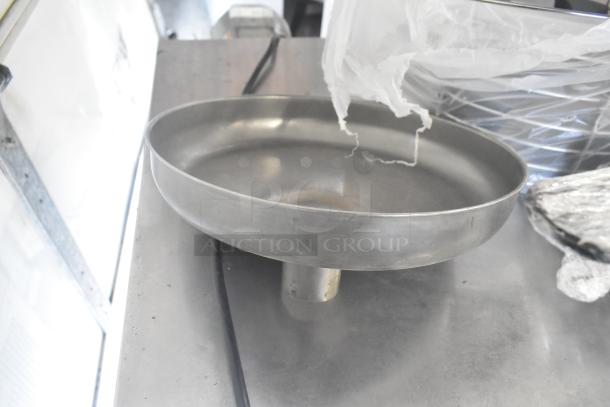 Three kitchen items: metal citrus juicer guard, meat grinder tray, taco shell fry basket; bidding multiplies by three.