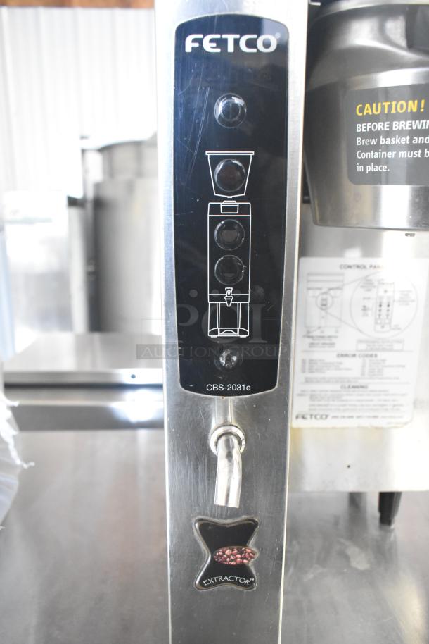 Fetco CBS-2031e commercial countertop coffee machine, 120V, 1 phase, features control panel and extractor label. Excellent condition.