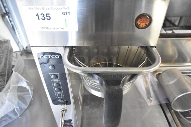 Fetco CBS-2031e Commercial Coffee Machine, 120V, 1 Phase. Stainless steel finish, control panel with buttons, and visible Fetco logo.