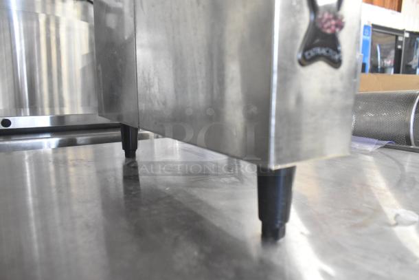 Fetco CBS-2031e commercial coffee machine, stainless steel, 120V, 1 phase, countertop model, shown with sturdy legs.