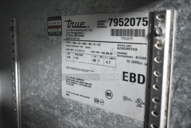 Label of True TBB-24-48G-SD-S-LD Commercial Back Bar Cooler, displaying model, voltage, and refrigerant details.