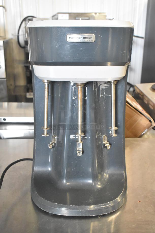 Hamilton Beach HMD400 countertop 3 head drink mixer, 120 volts, 1 phase, gray, visible wear, model label present.