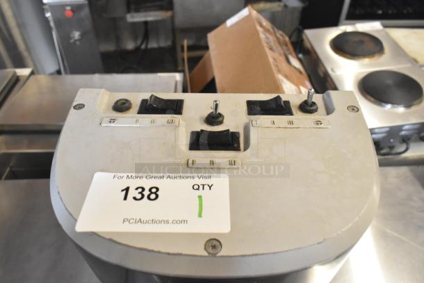 Hamilton Beach HMD400 3 Head Drink Mixer, 120 Volts, 1 Phase. Features switches, slightly worn condition, item tag visible.