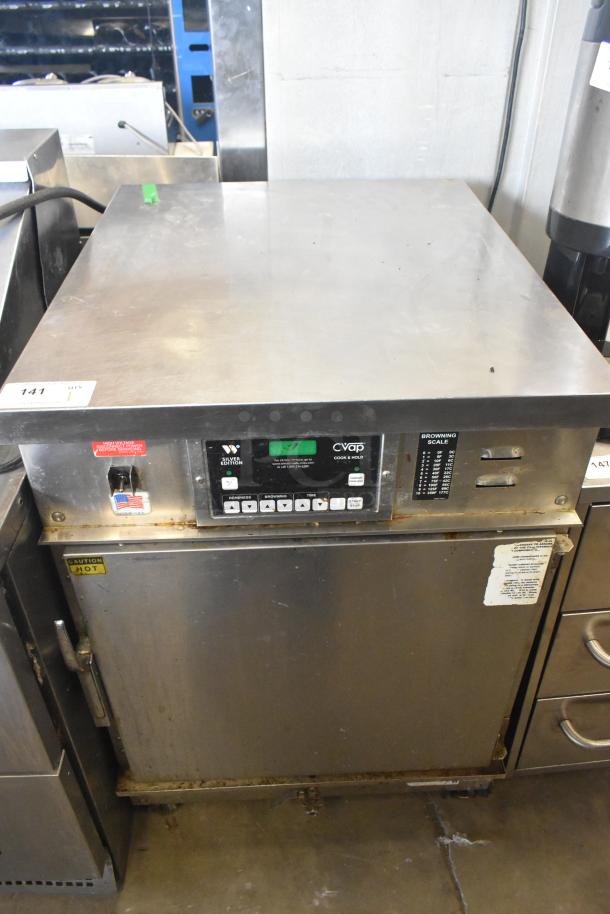 Winston CVap CAC509GR commercial heated holding cabinet on casters, 208V, 1 phase, includes controls and labels, used condition.