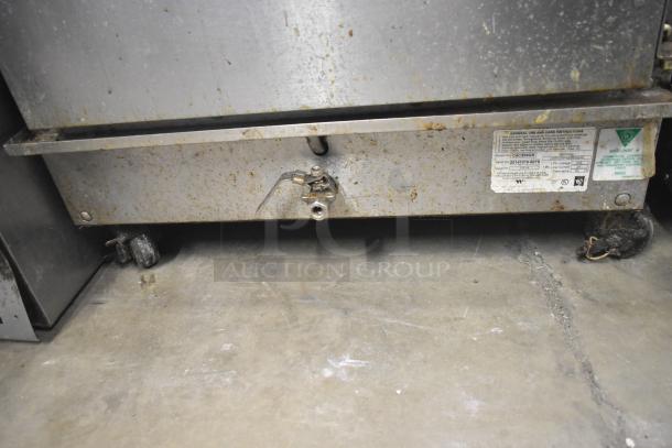 Winston CVap CAC509GR heated holding cabinet, 208V, 1 phase. Rustic condition, visible model label, on commercial casters.