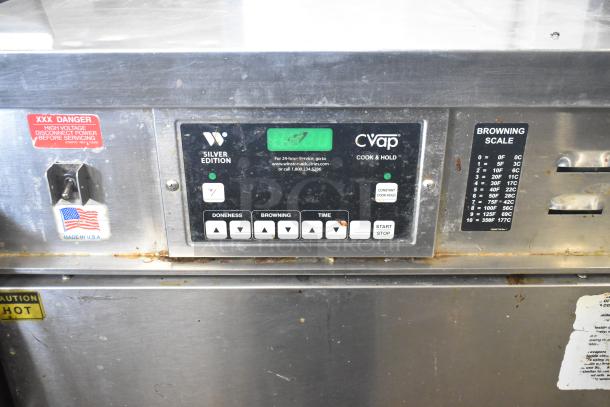 Winston CVap CAC509GR heated holding cabinet, commercial casters, 208V, 1 phase, browning scale, control panel visible.