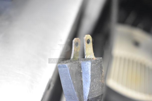 Close-up of power plug for Toastmaster TP409 Countertop 4 Slot Toaster, 115 Volts, showing two metal prongs.