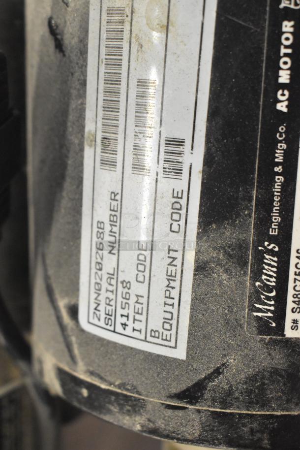 McCann's Motor, 115 Volts, 1 Phase, visible serial number ZN202068B, item code 41568, showing signs of wear.