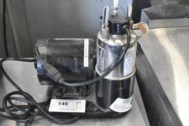 McCann's Motor, 115 Volt, 1 Phase, in used condition. Features visible wiring and labels indicating carbon dioxide usage.