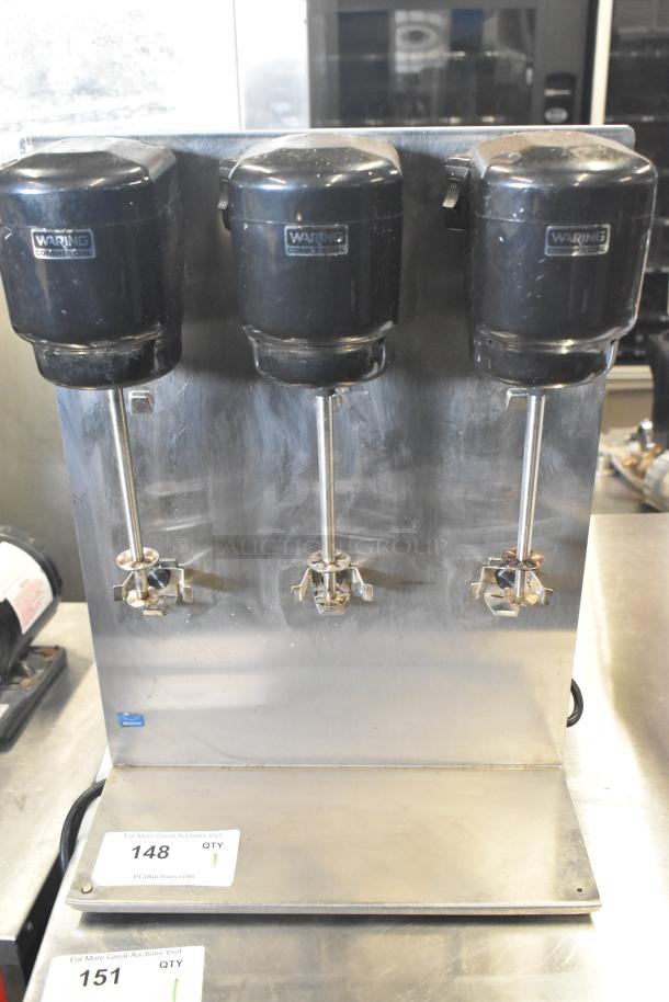 Waring 32DM16 countertop 3-head drink mixer, 120 volts, 1 phase, stainless steel, showing minor wear, with model labels.