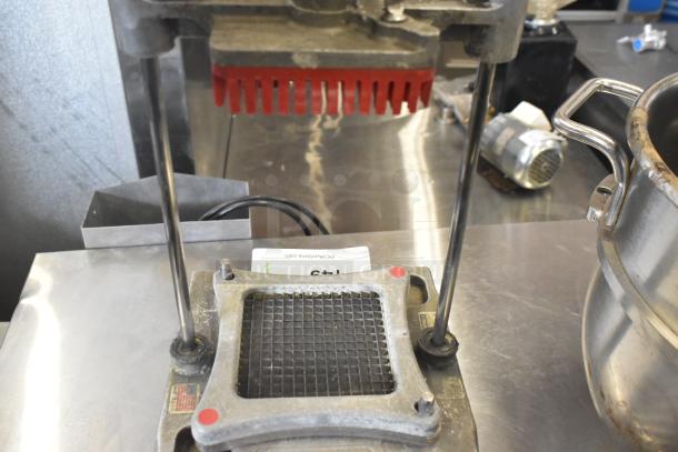 Nemco Countertop Vegetable Dicer with red blades and a stainless steel grid. In good used condition. Model intact.