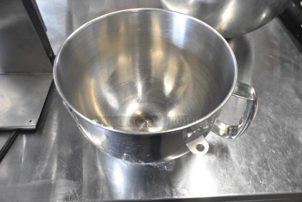 Stainless steel mixing bowl, part of a set including four bowls and one whisk attachment. Features A-30SS 30 quart capacity.